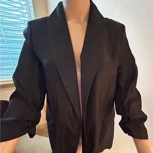 Black Blazer by Notations. Side pockets and gathered sleeves. Size Large